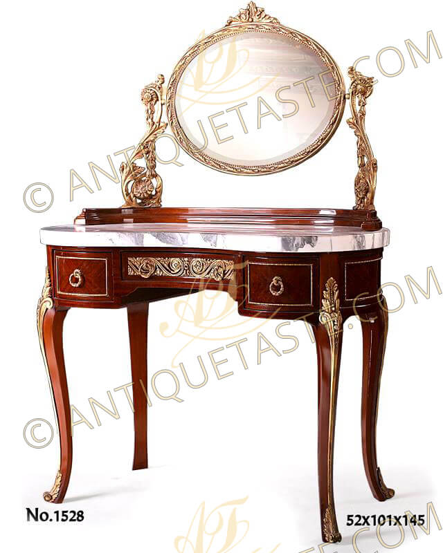 Awe-inspiring French Louis XV Rococo style gilt-ormolu-mounted veneer inlaid Coiffeuse after the model by Maxime Secretant, late 19th-early 20th century, The splendacious kidney-shaped quarter-veneered dressing table is surmounted by an adjustable fine chiseled gilt ormolu oval mirror supported by rococo style scrolled-acanthus and intricate cast uprights, resting on a half circular beveled wooden support above a marble top. The frieze fronted by a central drawer ornamented with an ormolu running hammered background Vitruvian scrolls design with reeded ormolu ring handles, flanked to each side by a short drawer, the convex sides and the short drawers are framed with ormolu trim. The coiffeuse  stands on tapering cabriole legs headed by an intricate ormolu acanthus foliate clasps running to scroll-acanthus sabots
